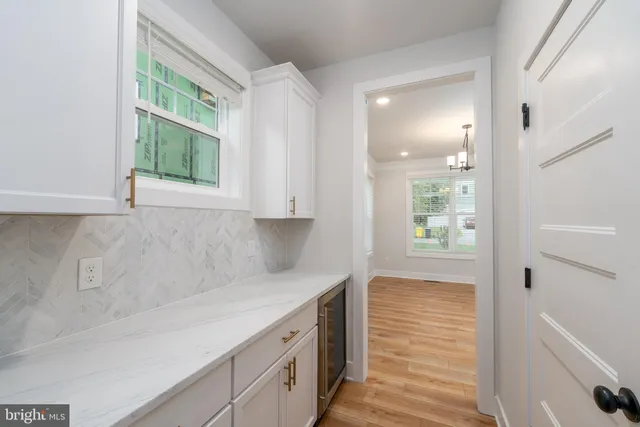 a bathroom with a sink toilet and mirror