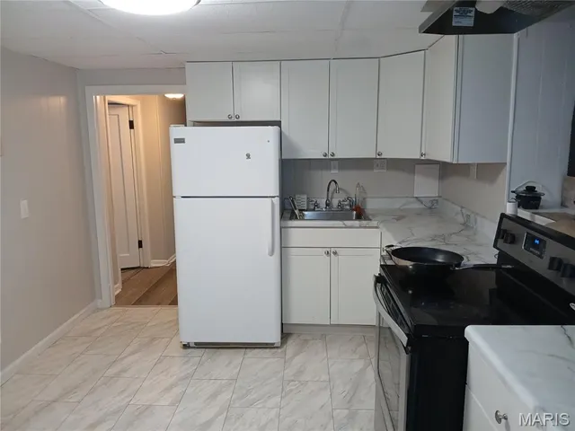 $215,000 | 7544 York Drive, Unit B, Clayton, MO 63105