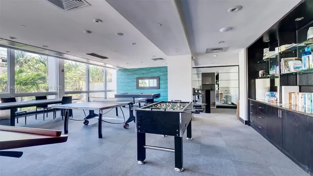 a view of a livingroom with furniture window and outside view
