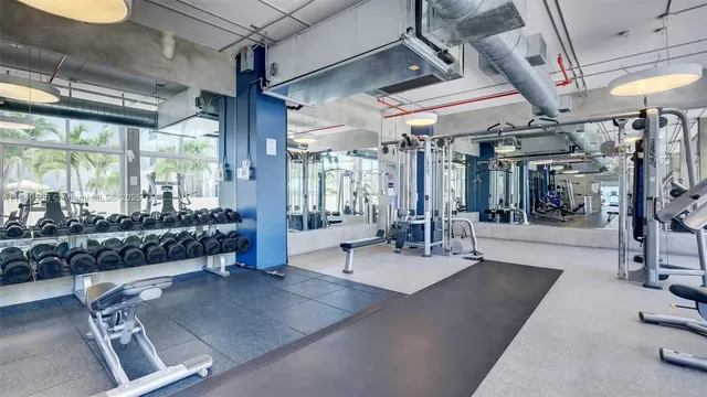 a lobby with furniture and window