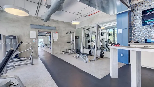 a view of a living room and bathroom