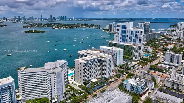 a front view of a house with outdoor seating