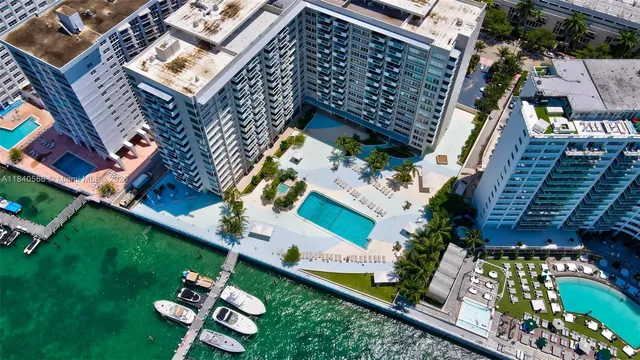 an aerial view of a house with a garden
