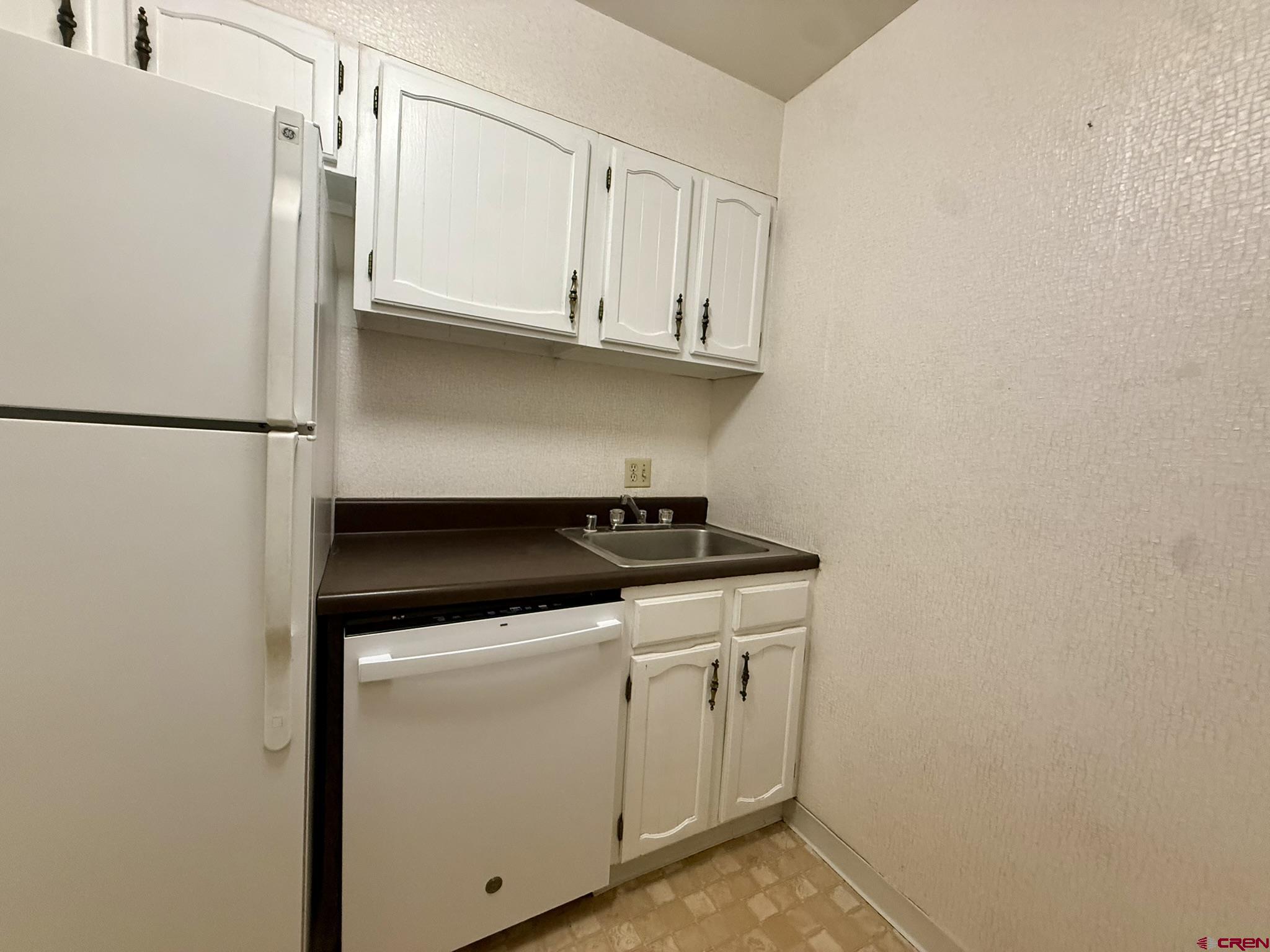 34237 Highway 550, Unit 27 Durango, CO 81301 - Photo 9 of 45 a utility room with dryer and washer