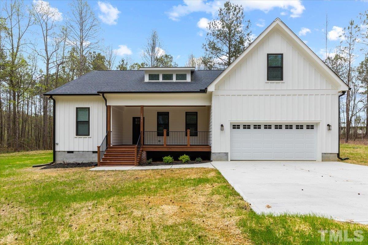 1893 Pilot-Riley Road Zebulon, NC 27597 - Photo 1 of 50 a view of front of house with a yard