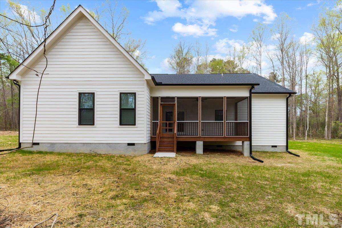 1893 Pilot-Riley Road Zebulon, NC 27597 - Photo 46 of 50 a view of a house with a yard