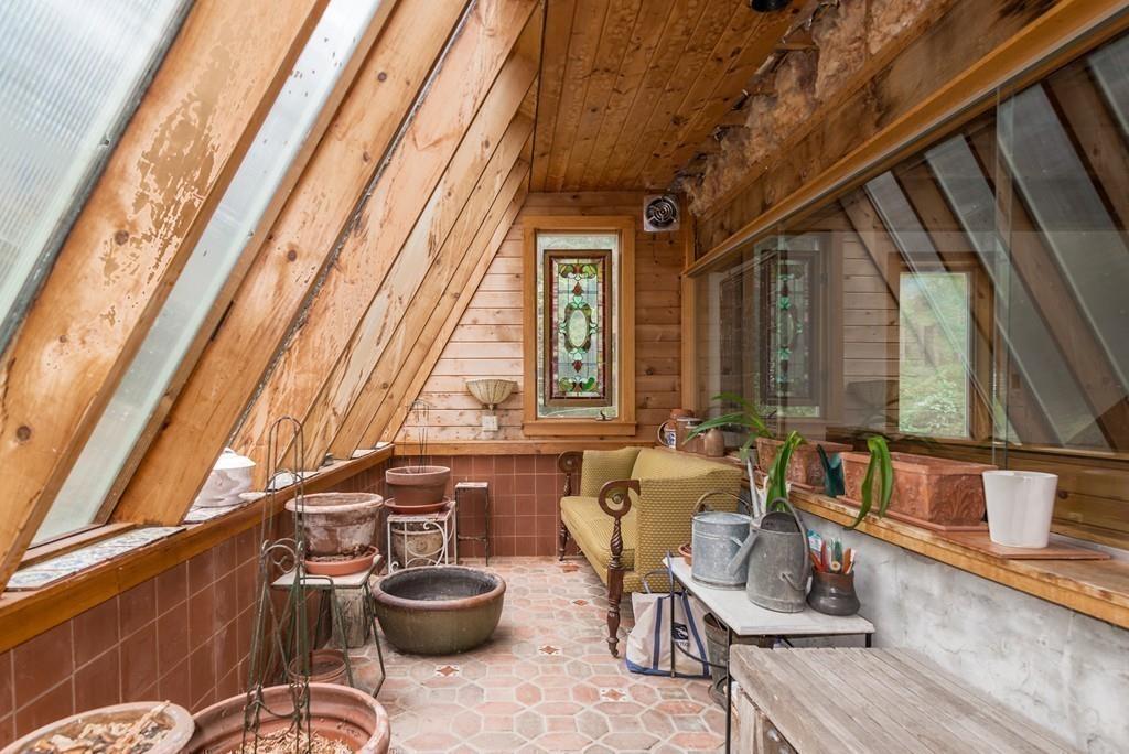 190 Argilla Road Ipswich, MA 01938 - Photo 14 of 40 a living room with furniture and a potted plant
