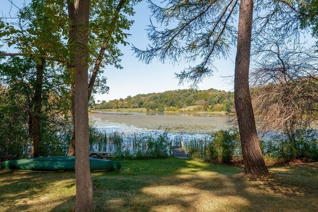 190 Argilla Road Ipswich, MA 01938 - Photo 32 of 40 a view of a lake with a large tree