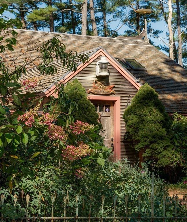 190 Argilla Road Ipswich, MA 01938 - Photo 5 of 40 an aerial view of a house with a yard and potted plants