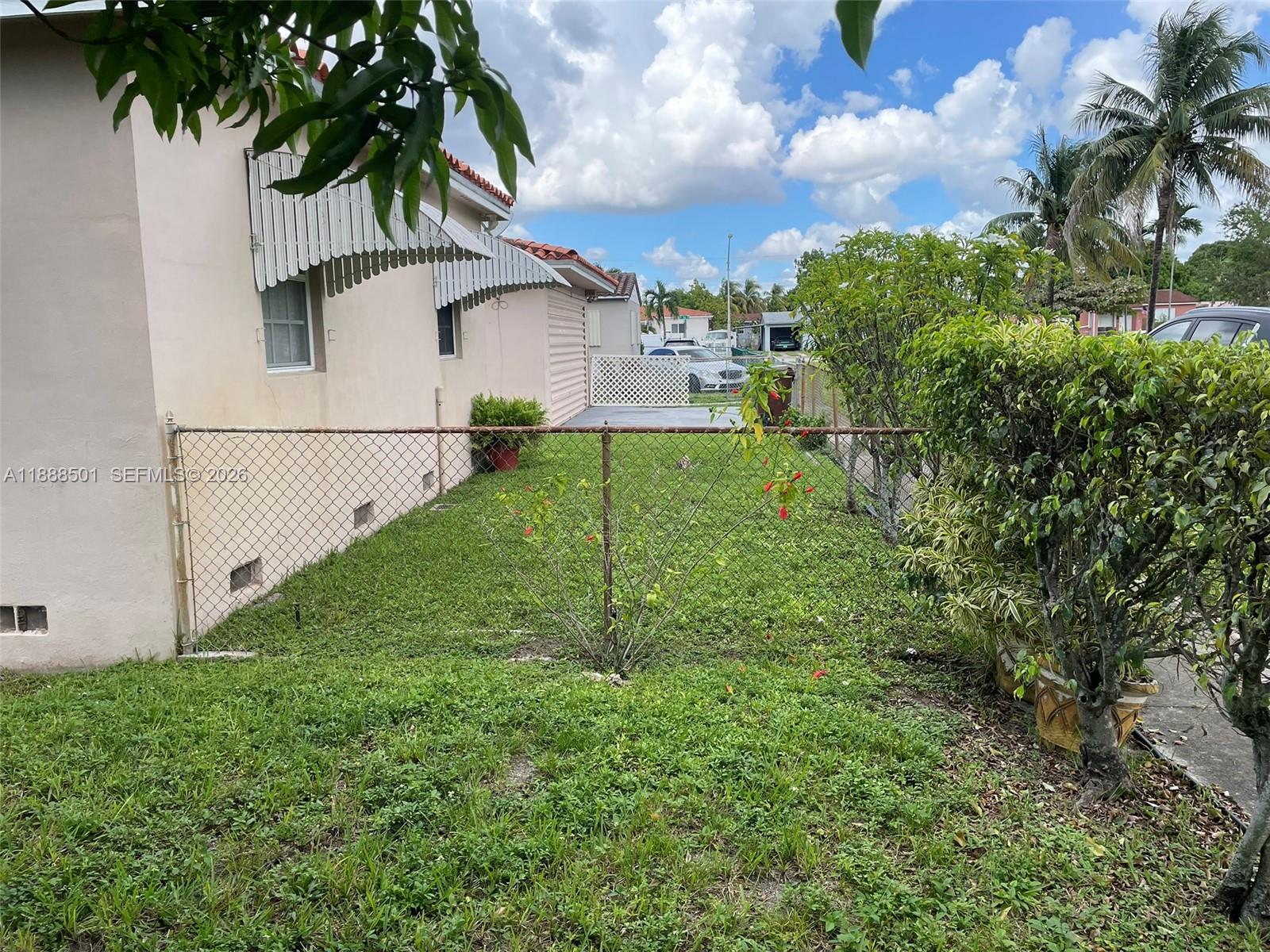 265 West 55th Street Hialeah, FL 33012 - Photo 13 of 58 a view of a backyard