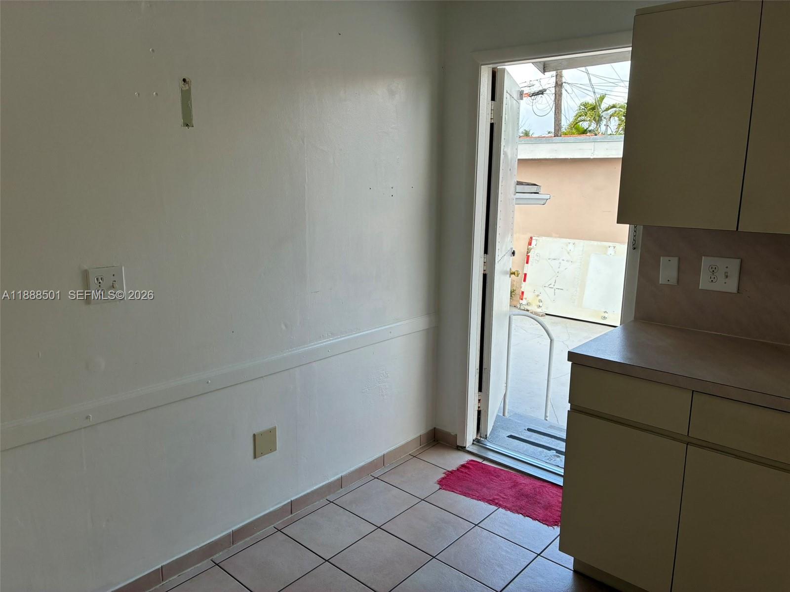 265 West 55th Street Hialeah, FL 33012 - Photo 22 of 58 a area with window and a table