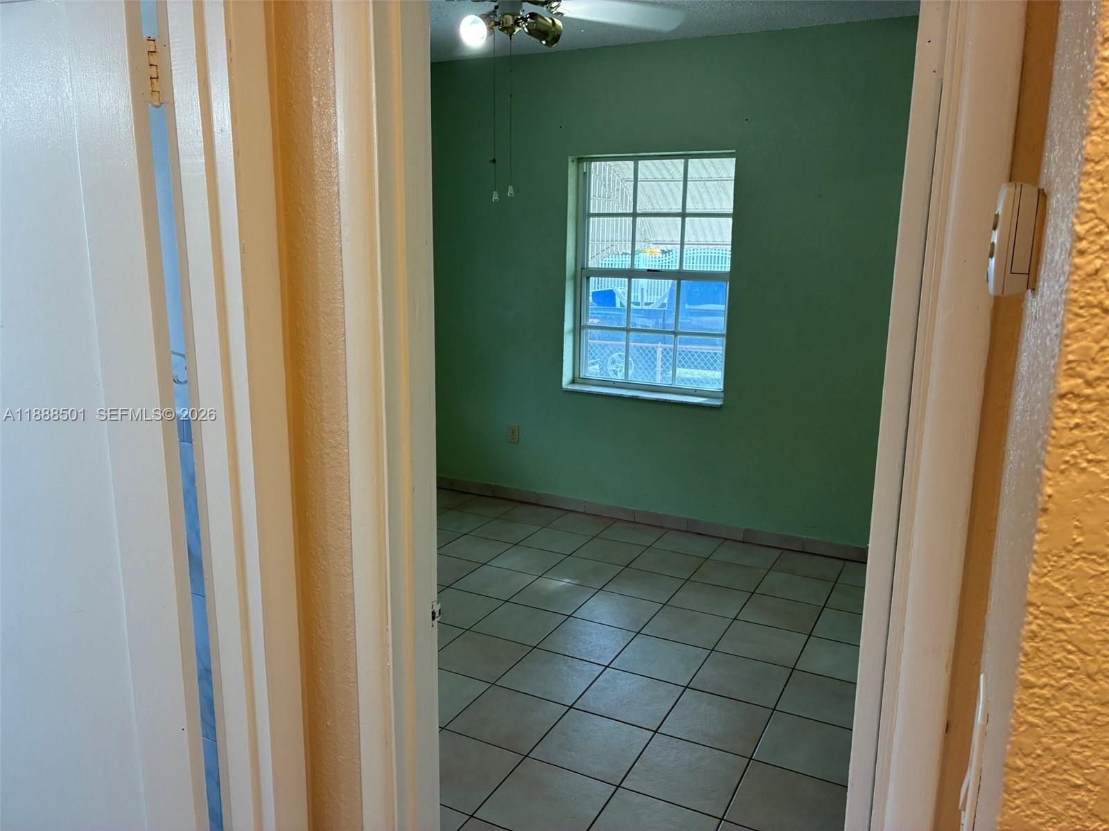 265 West 55th Street Hialeah, FL 33012 - Photo 37 of 58 a view of an empty room and window