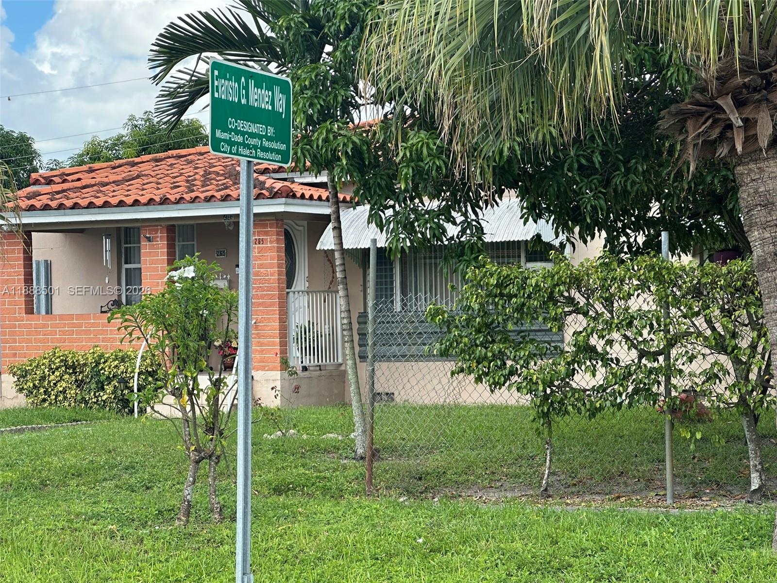 265 West 55th Street Hialeah, FL 33012 - Photo 7 of 58 a house view with a garden space