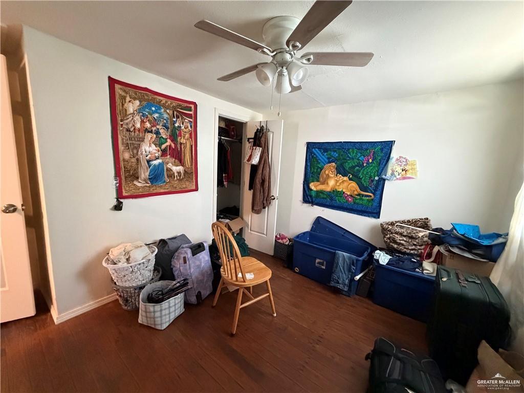 865 Rio Grande Street San Benito, TX 78586 - Photo 6 of 10 a living room with furniture and a flat screen tv