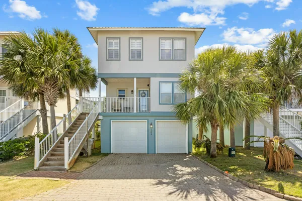 a house view with a backyard space