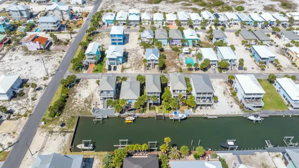a view of balcony with chairs and table