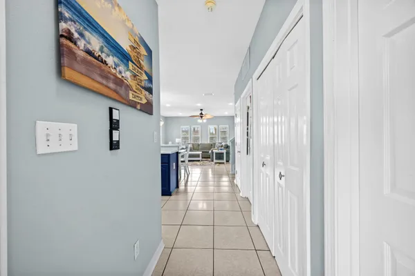 a kitchen with stainless steel appliances a refrigerator sink and cabinets