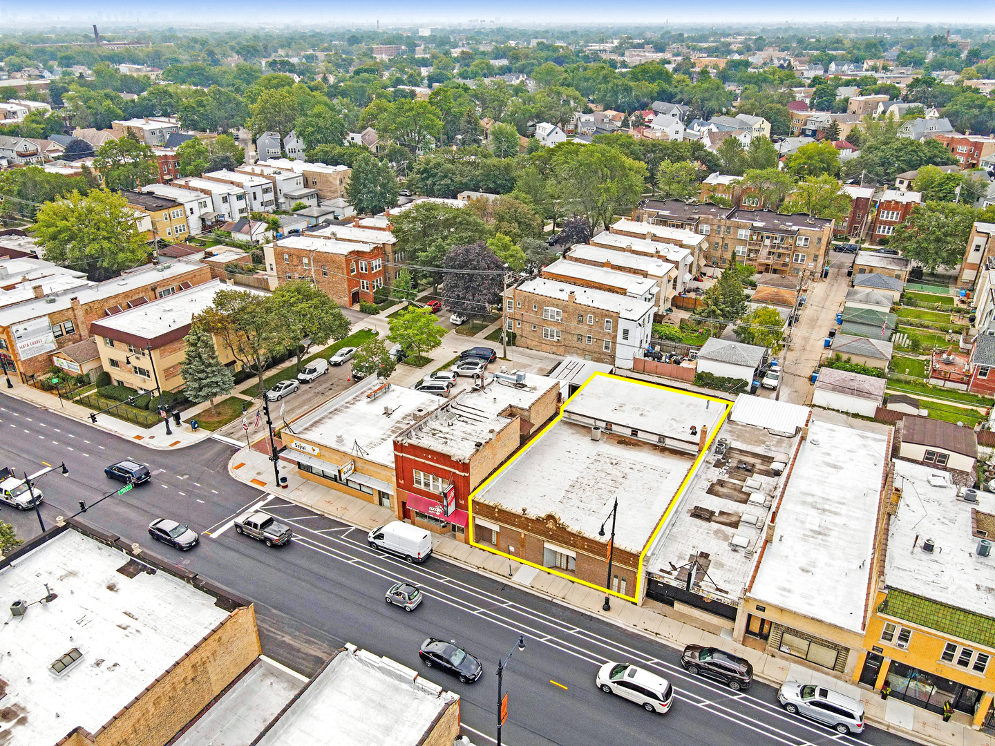 an aerial view of a city with lots of residential buildings