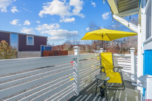a view of a swimming pool with a lounge chairs