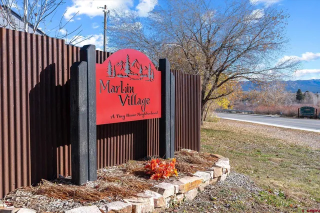 a sign on the side of a road