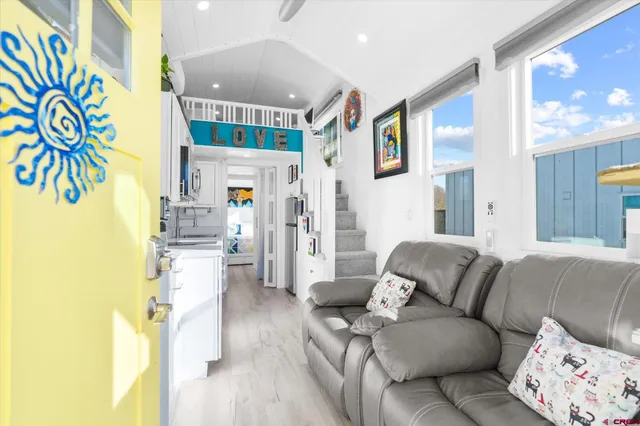 a living room with furniture and a couch