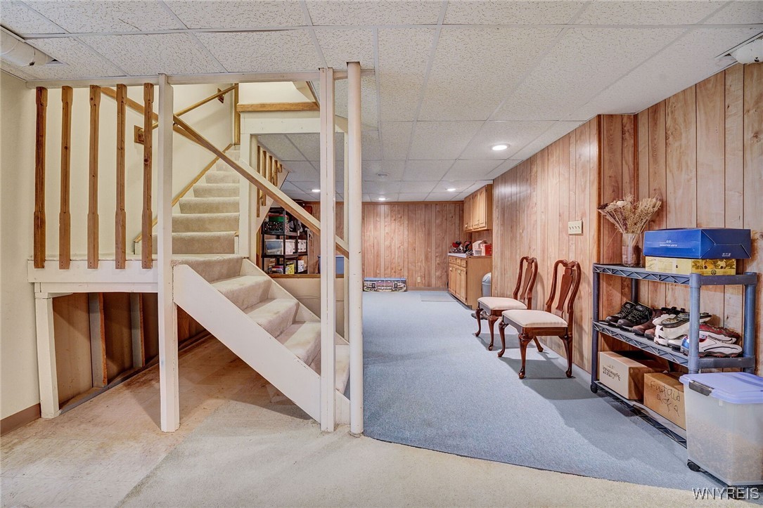 7353 Ward Road Boston, NY 14127 - Photo 41 of 45 CARPETED REC ROOM- CABINETRY ON WALL