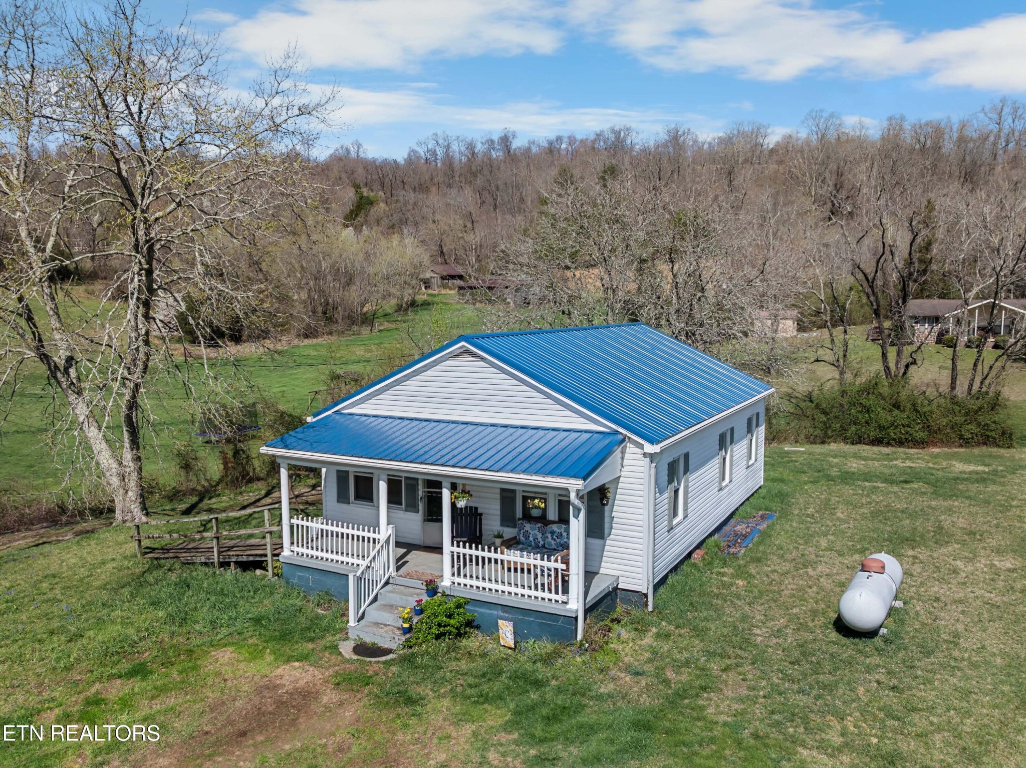 385 Hubbs Grove Road Maynardville, TN 37807 - Photo 20 of 33 a house that has a lot of plants in it