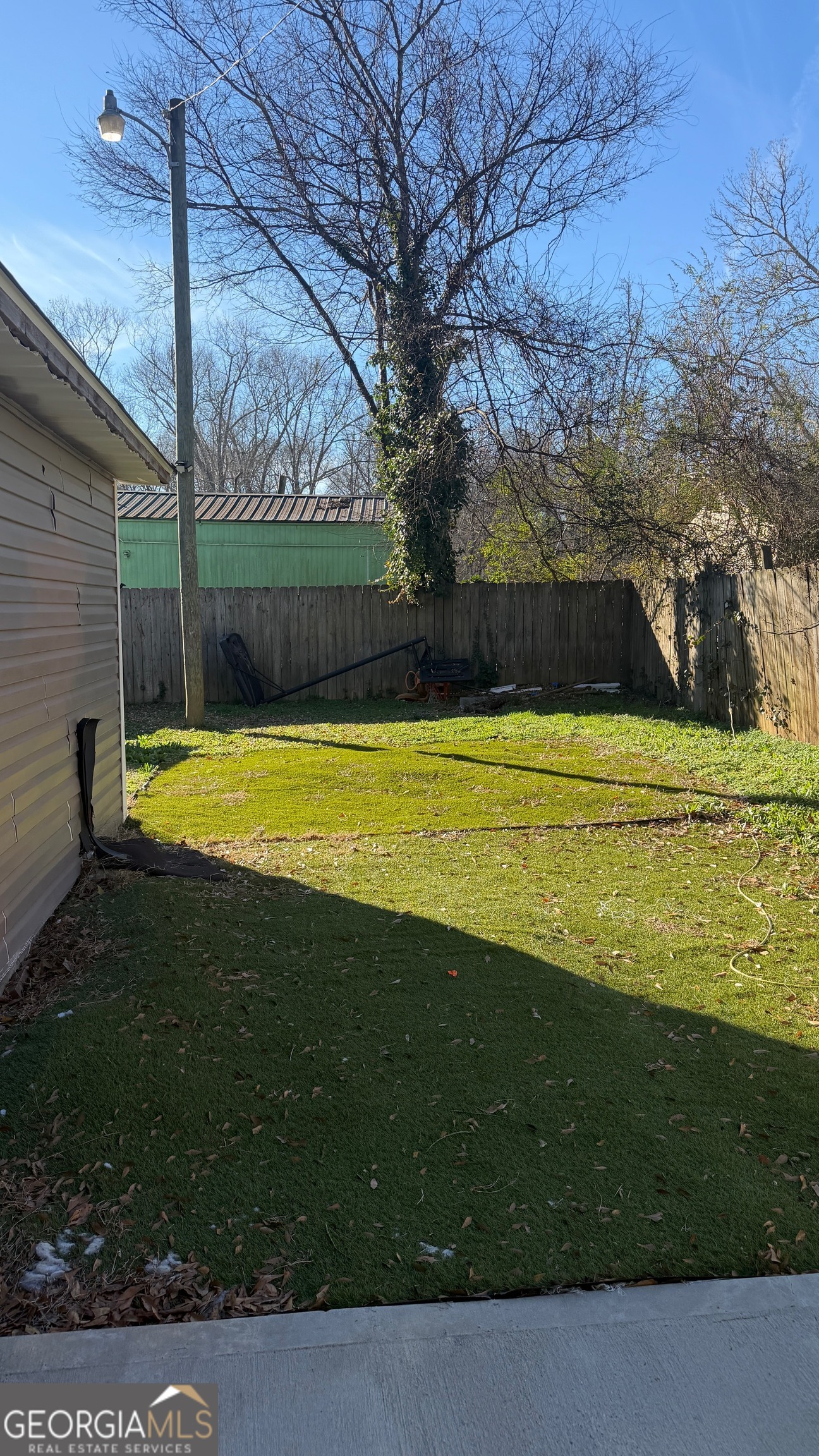 207 Wilkerson Road Southwest Rome, GA 30165 - Photo 3 of 11 a view of a swimming pool with a yard