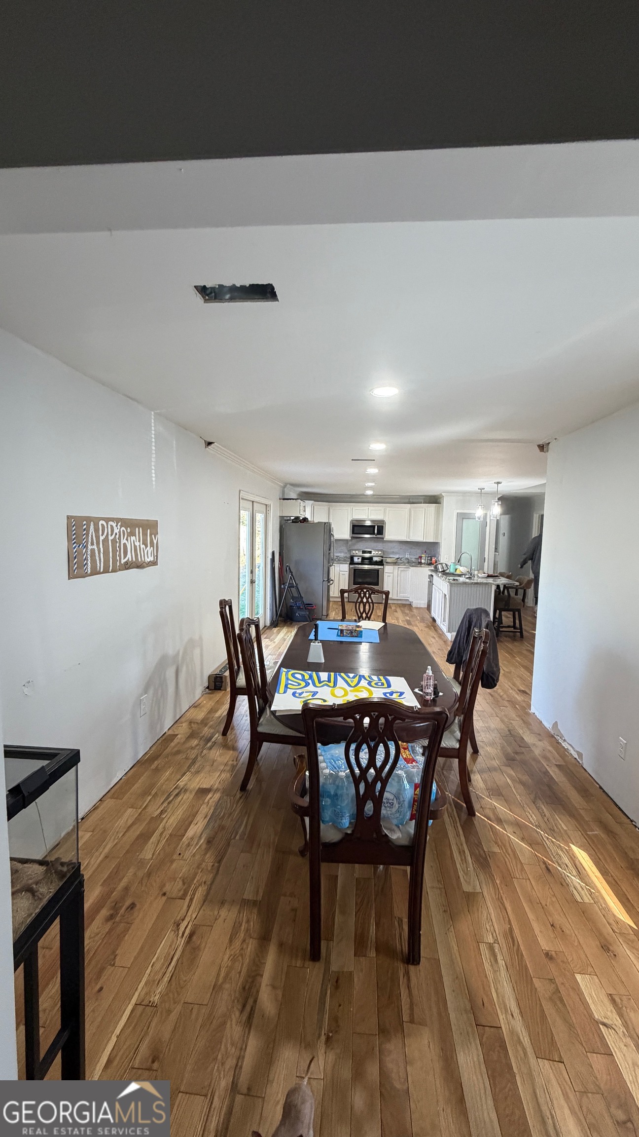 207 Wilkerson Road Southwest Rome, GA 30165 - Photo 4 of 11 a view of a dining room with furniture and wooden floor