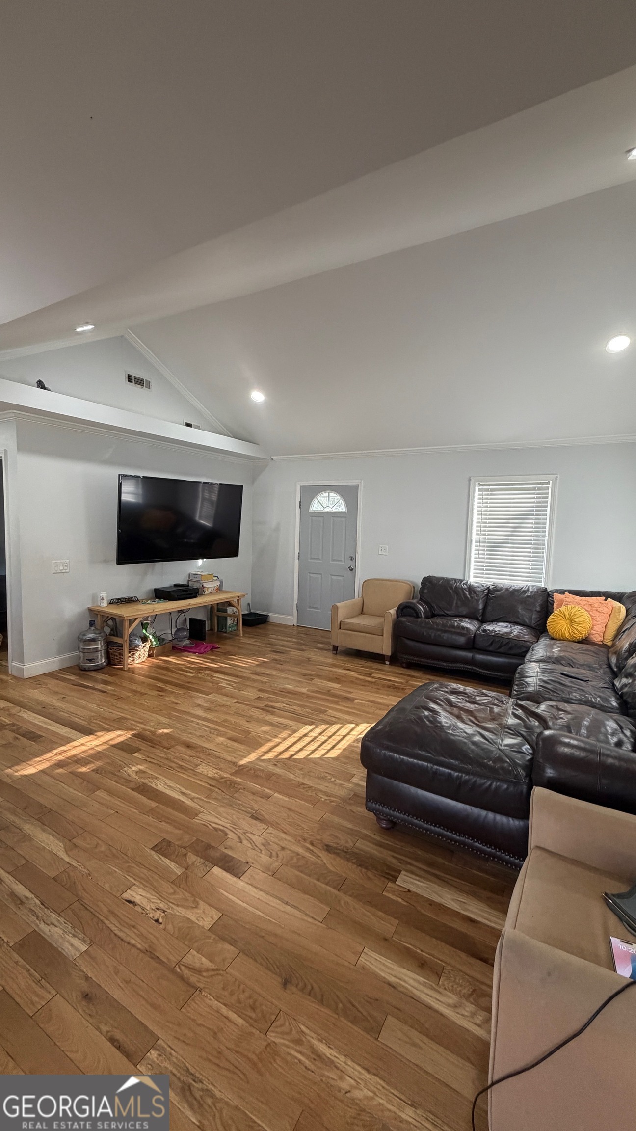 207 Wilkerson Road Southwest Rome, GA 30165 - Photo 5 of 11 a living room with furniture and a flat screen tv
