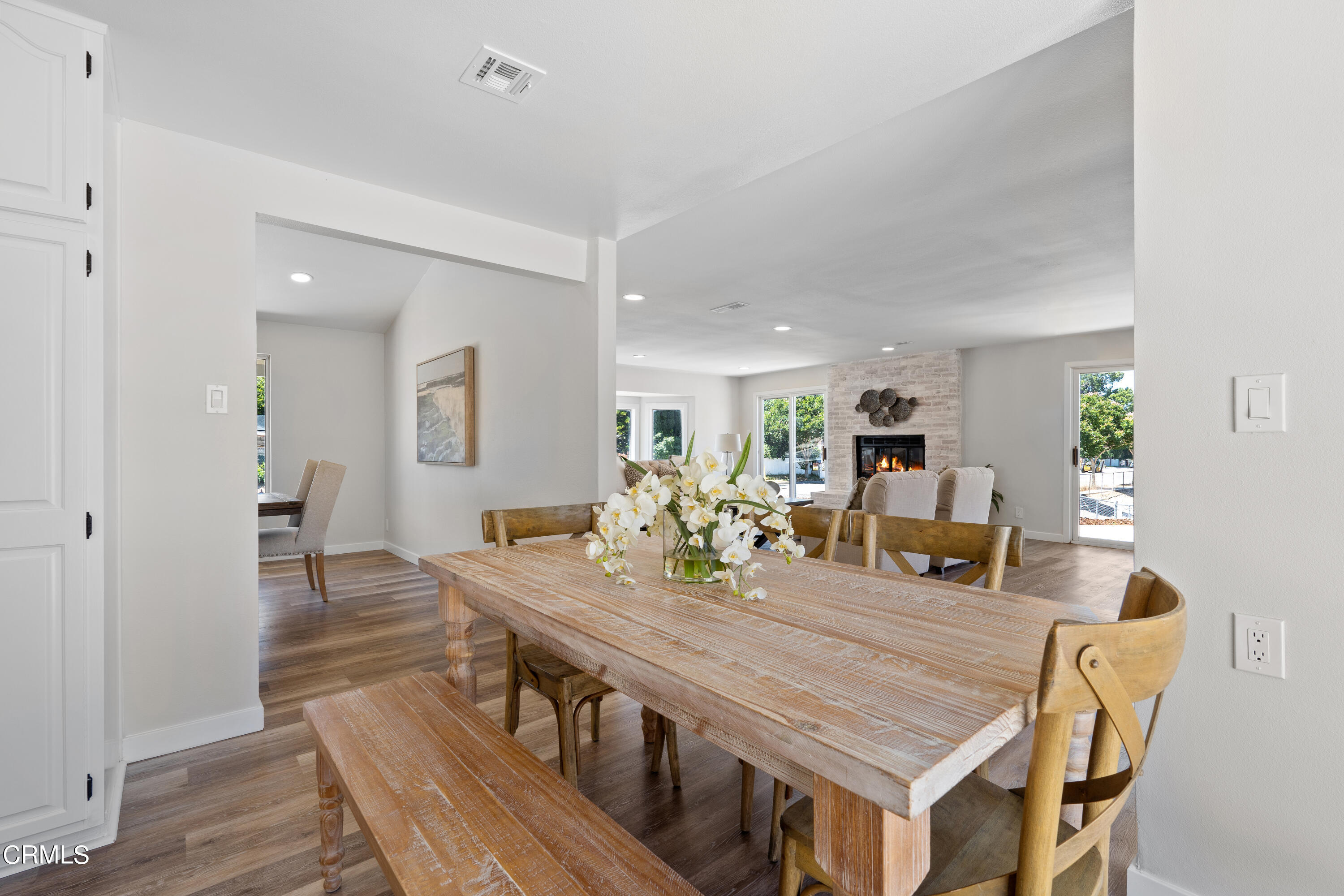 1007 Appleton Road Simi Valley, CA 93065 - Photo 12 of 29 a dining room with furniture and wooden floor
