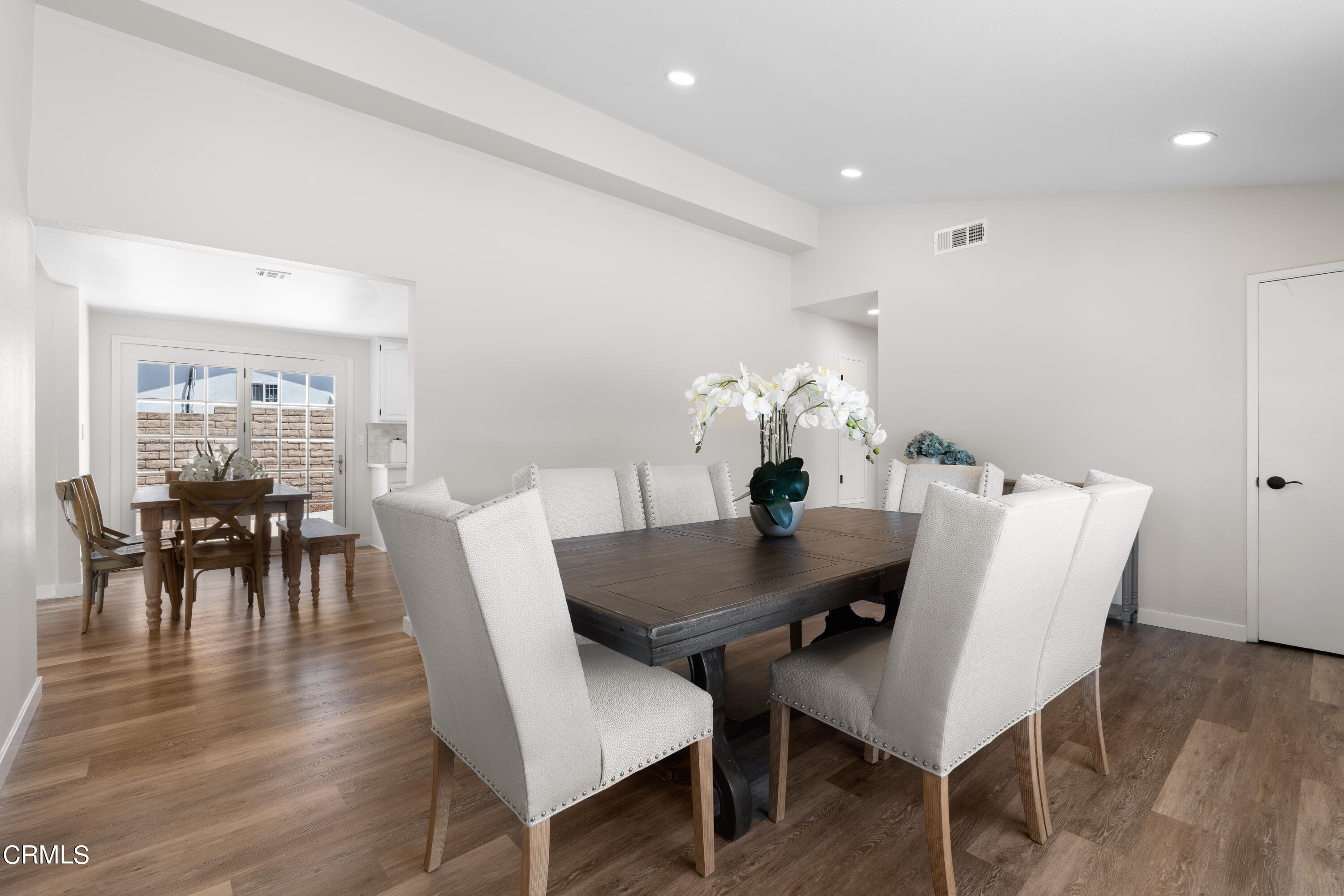 1007 Appleton Road Simi Valley, CA 93065 - Photo 13 of 29 a view of a dining room with furniture and wooden floor