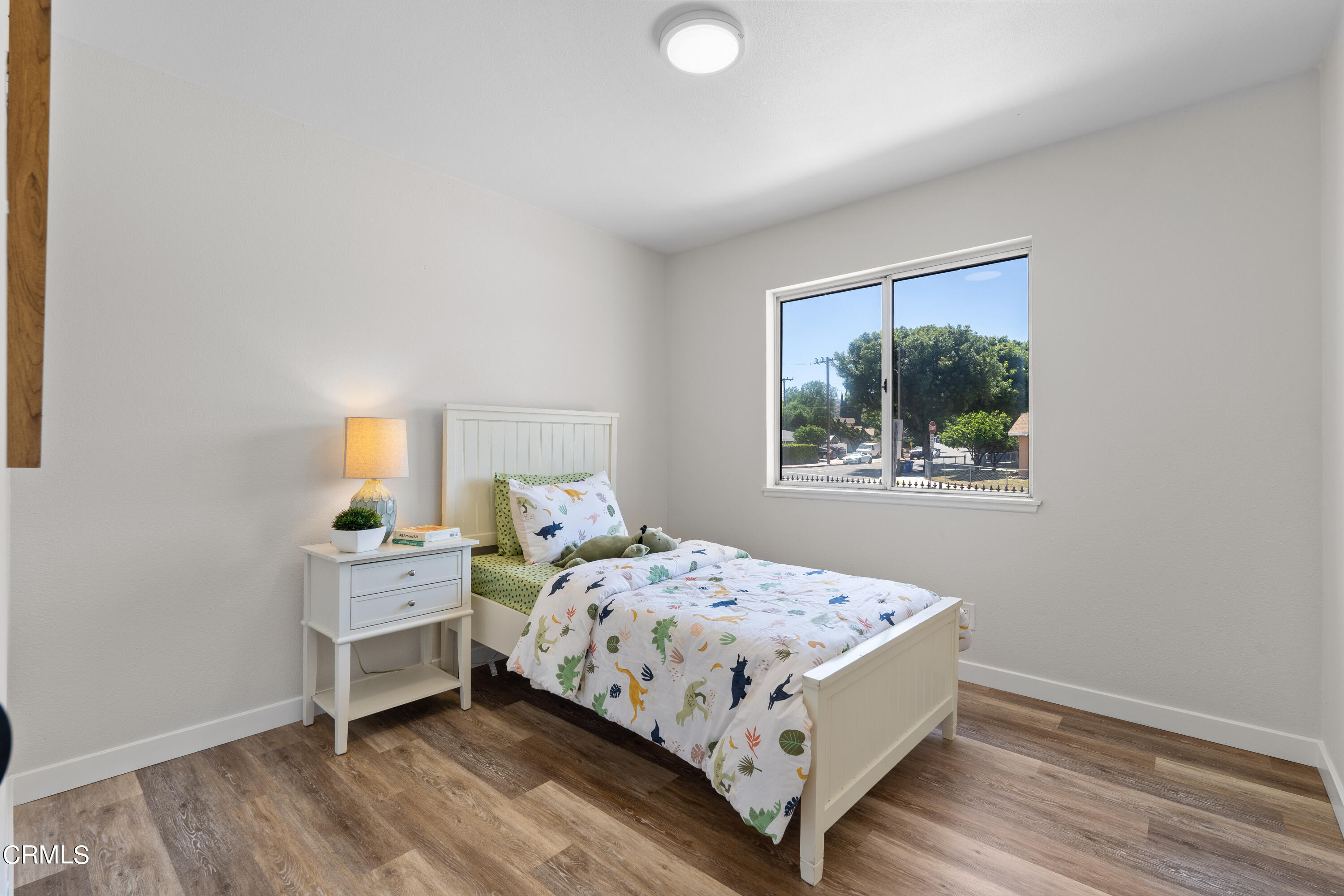 1007 Appleton Road Simi Valley, CA 93065 - Photo 18 of 29 a bedroom with a bed and a window