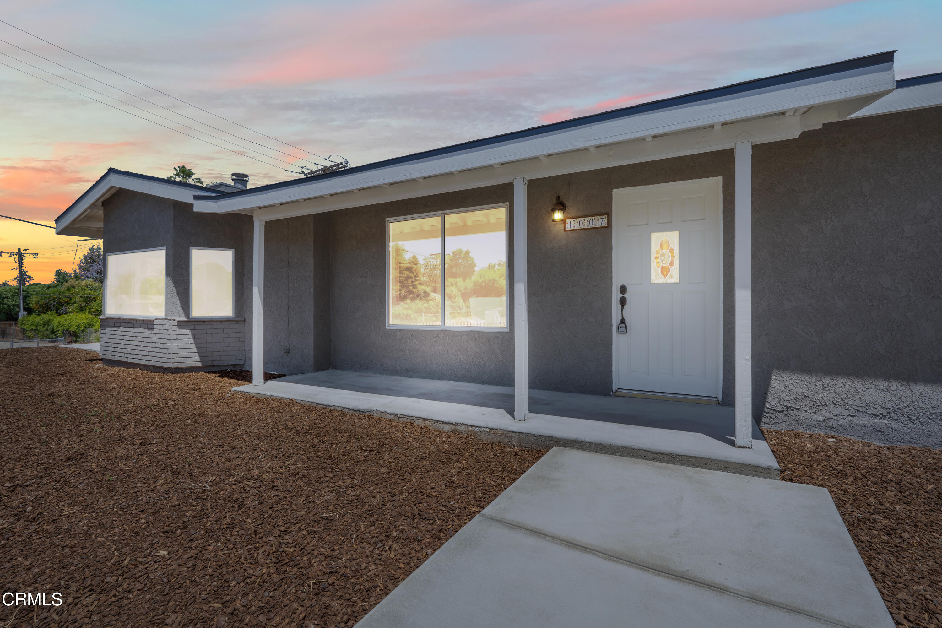 1007 Appleton Road Simi Valley, CA 93065 - Photo 25 of 29 a view of an empty room with a fireplace and a window