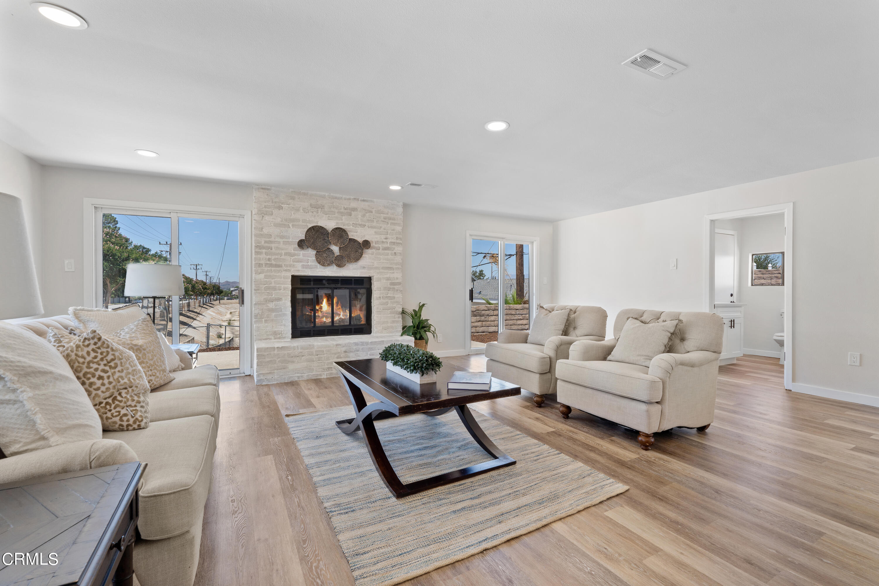 1007 Appleton Road Simi Valley, CA 93065 - Photo 4 of 29 a living room with furniture and wooden floor