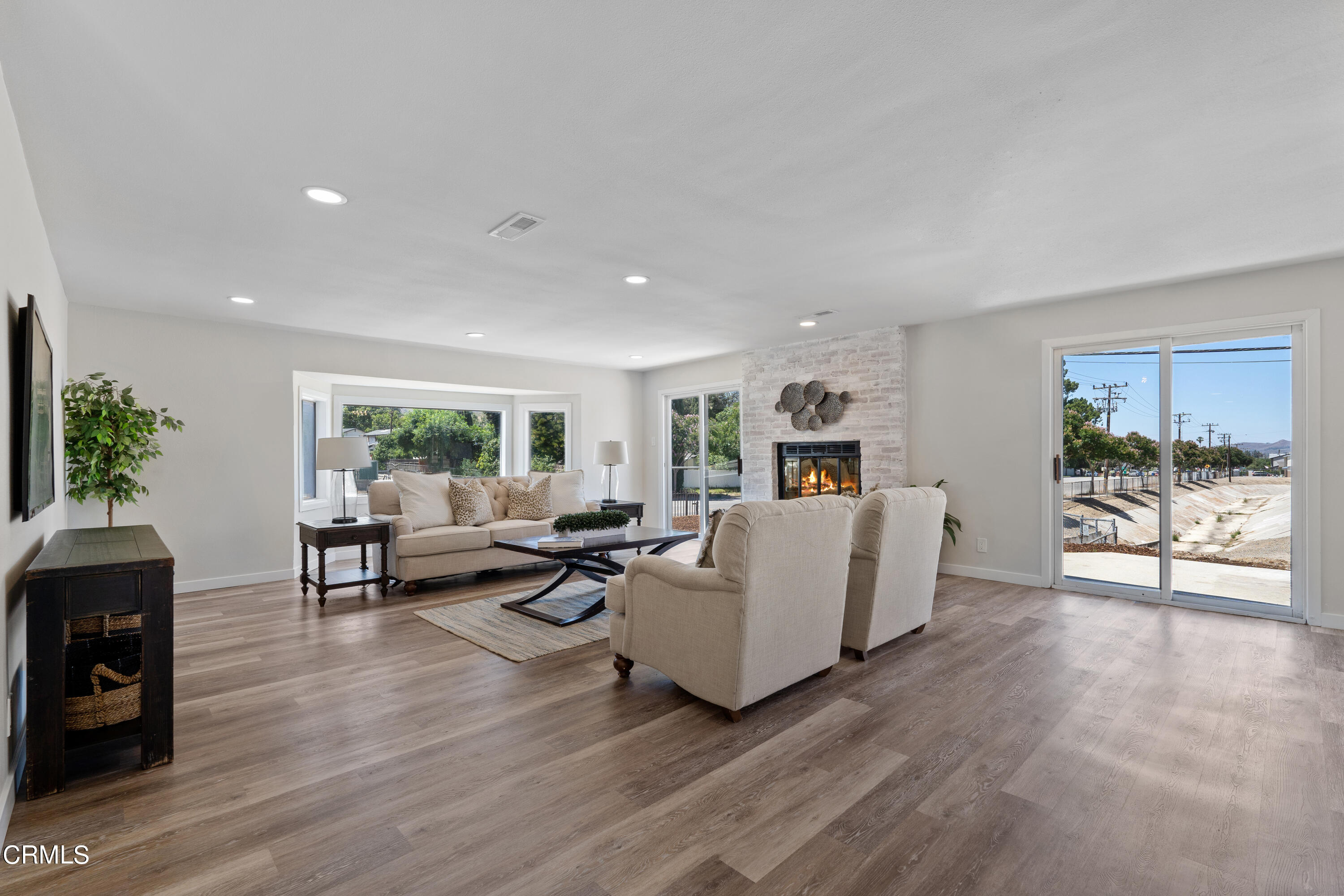 1007 Appleton Road Simi Valley, CA 93065 - Photo 5 of 29 a living room with furniture and a large window
