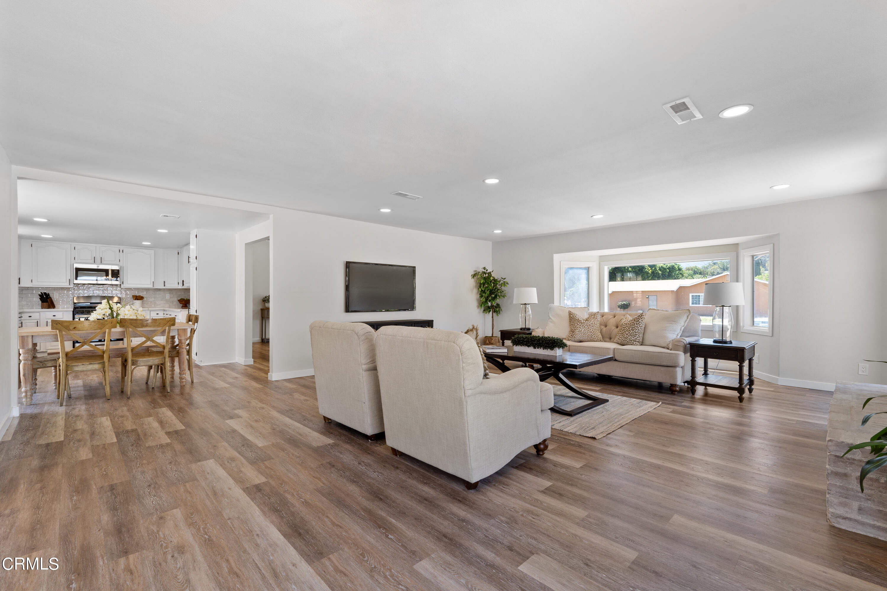1007 Appleton Road Simi Valley, CA 93065 - Photo 6 of 29 a living room with furniture and a wooden floor
