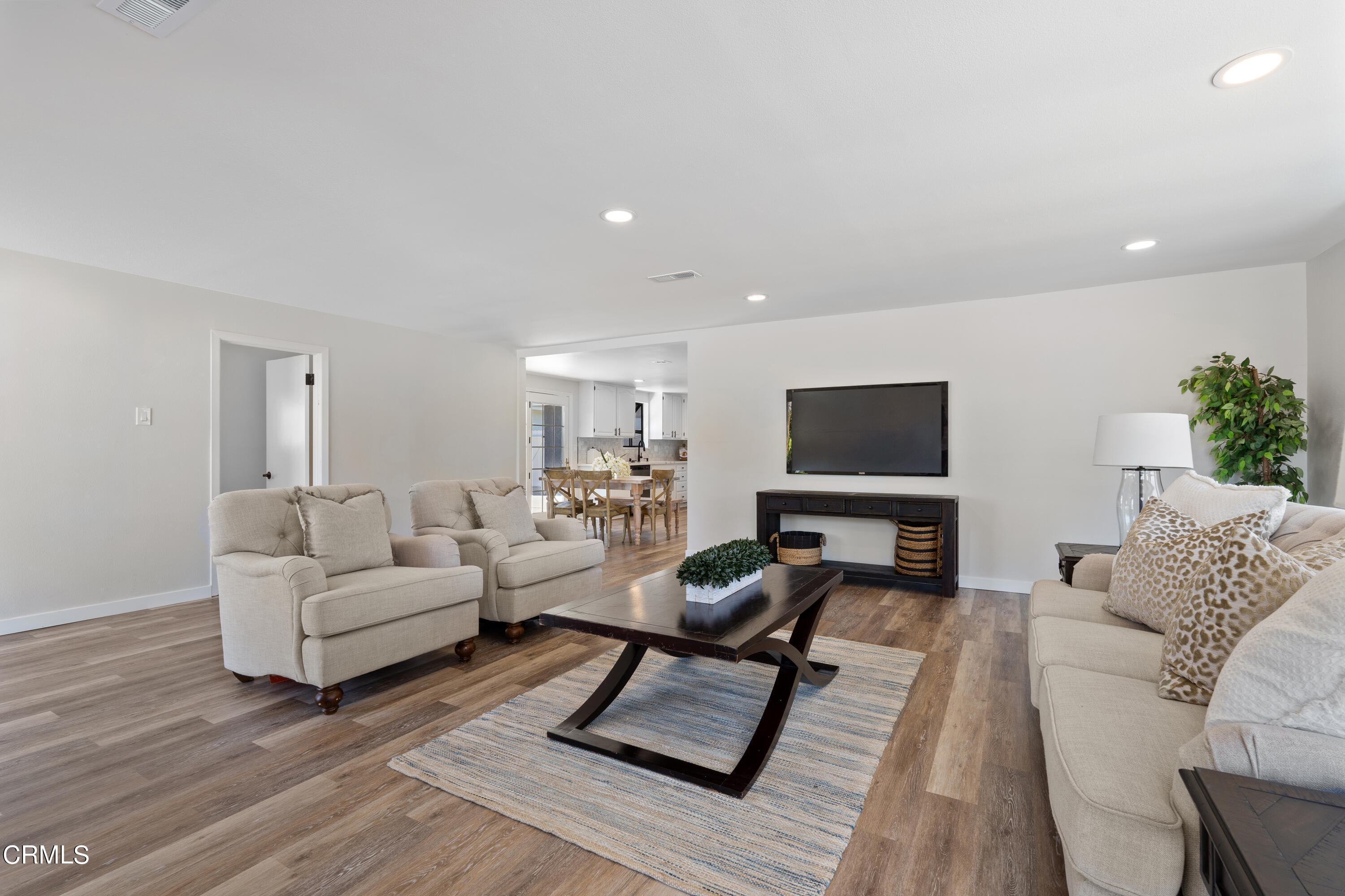 1007 Appleton Road Simi Valley, CA 93065 - Photo 7 of 29 a living room with furniture and a flat screen tv
