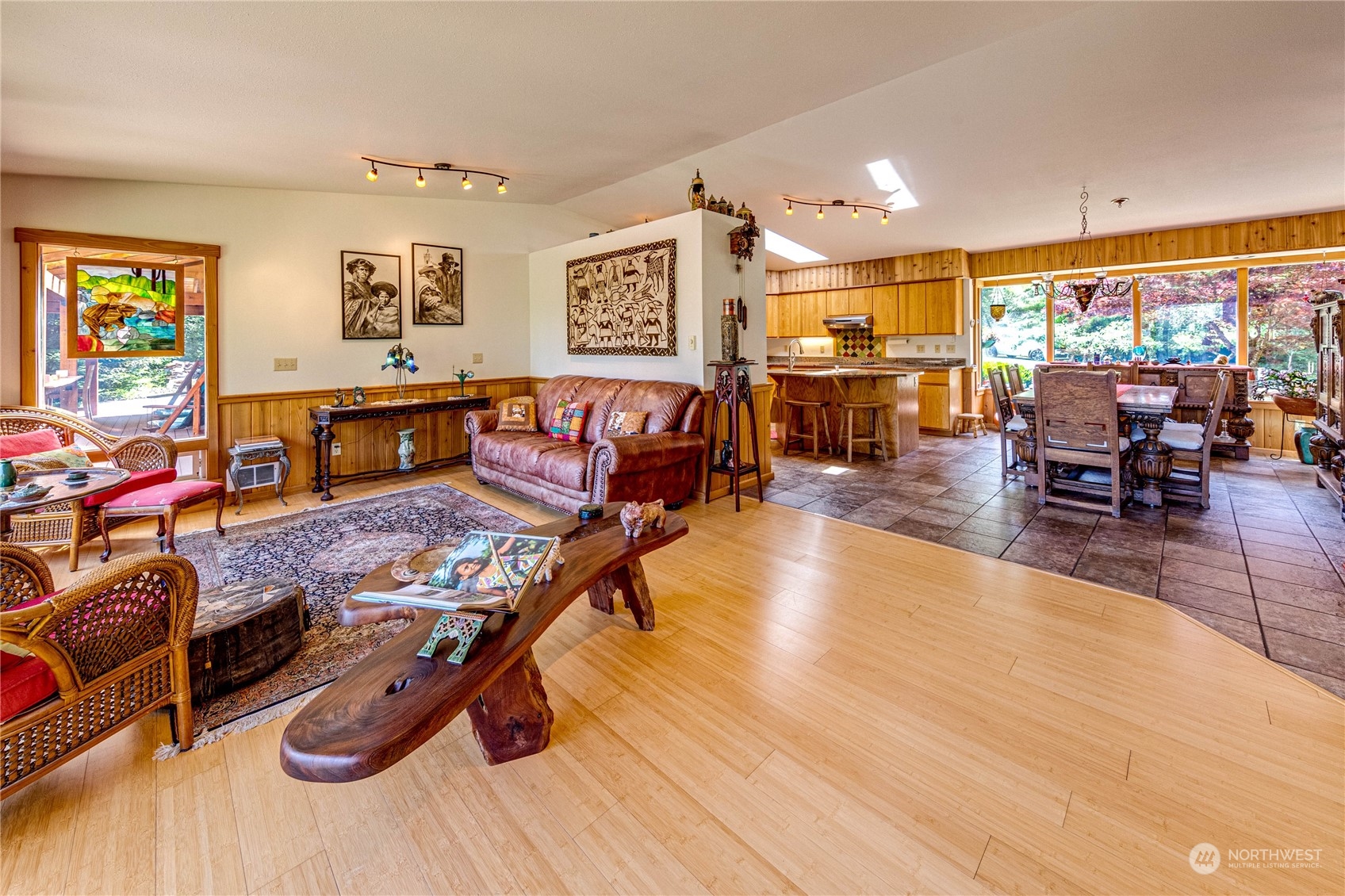 443 Westridge Road Port Angeles, WA 98363 - Photo 12 of 40 a living room with furniture kitchen view and a wooden floor