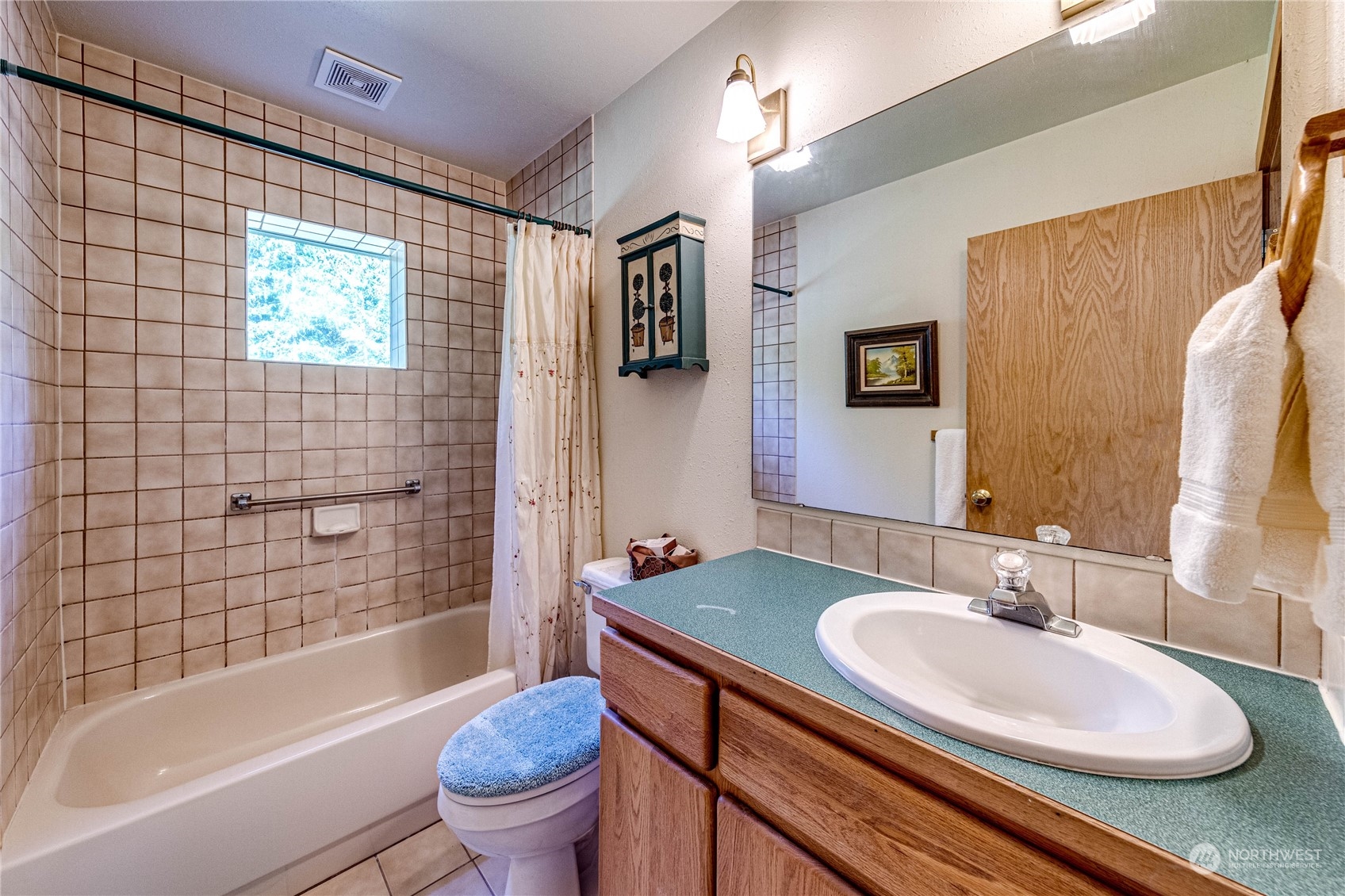 443 Westridge Road Port Angeles, WA 98363 - Photo 30 of 40 a bathroom with a sink a toilet and shower