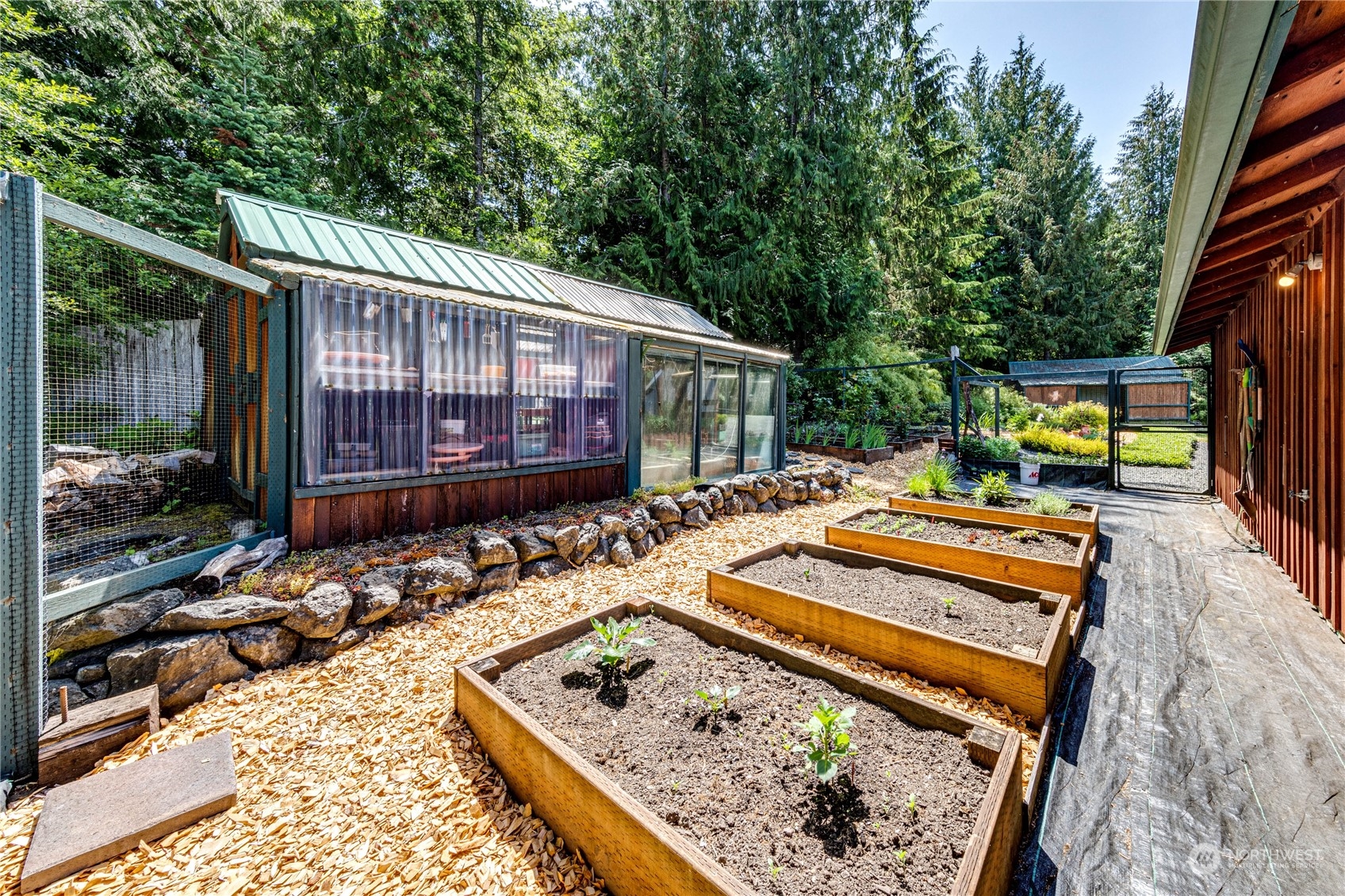 443 Westridge Road Port Angeles, WA 98363 - Photo 33 of 40 a view of a backyard with sitting area
