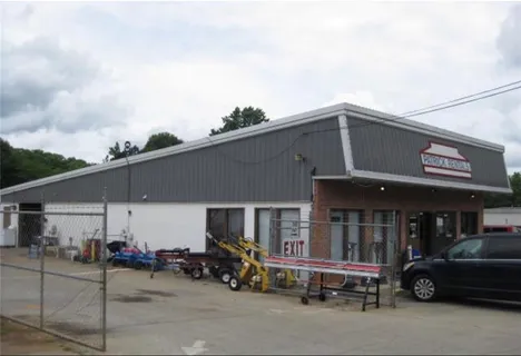 a view of a building with sitting area