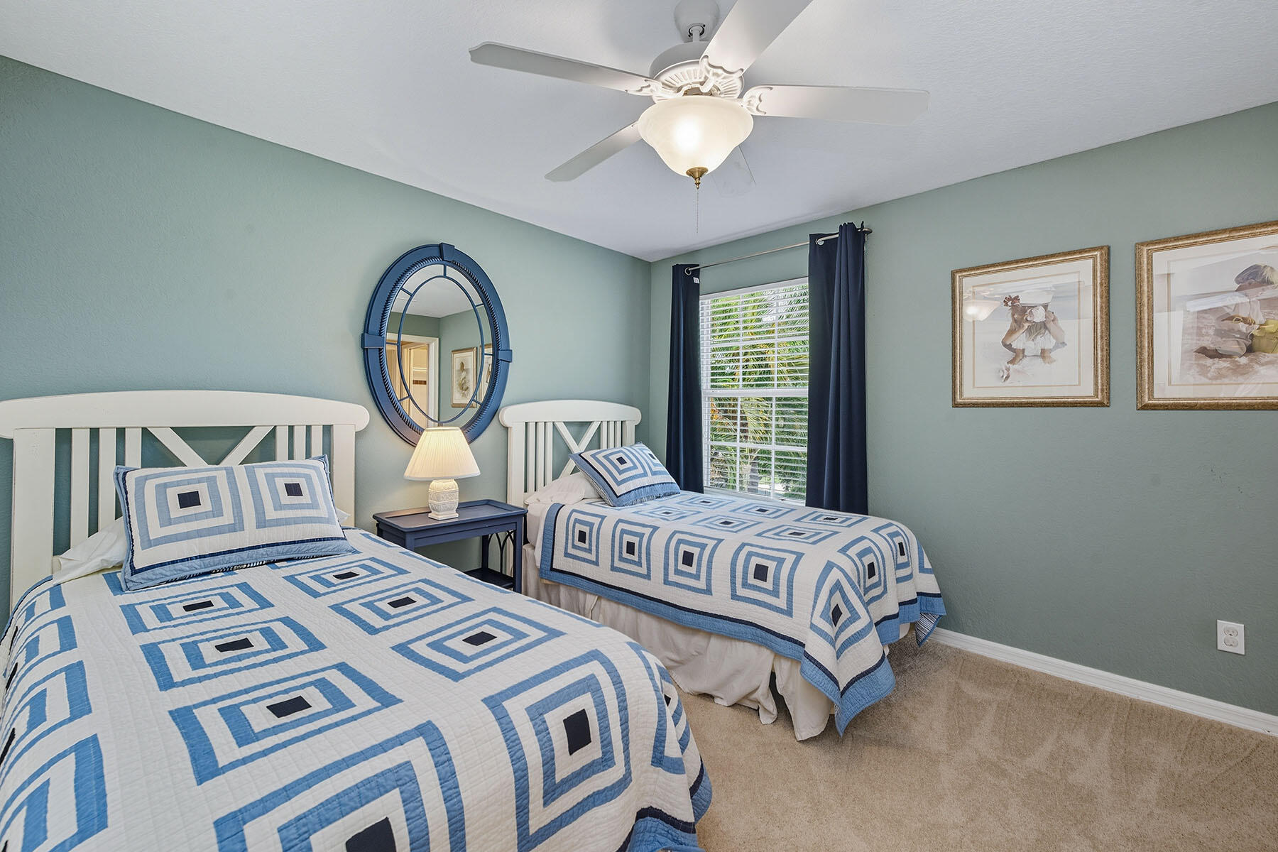 8582 Peppertree Way Naples, FL 34114 - Photo 22 of 50 a bedroom with two beds and a large window