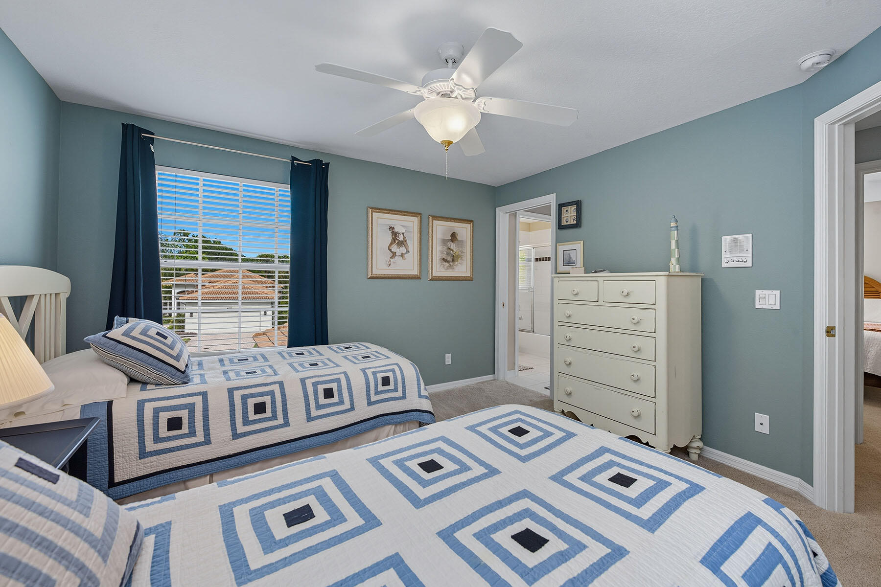 8582 Peppertree Way Naples, FL 34114 - Photo 23 of 50 a bedroom with a bed and a window