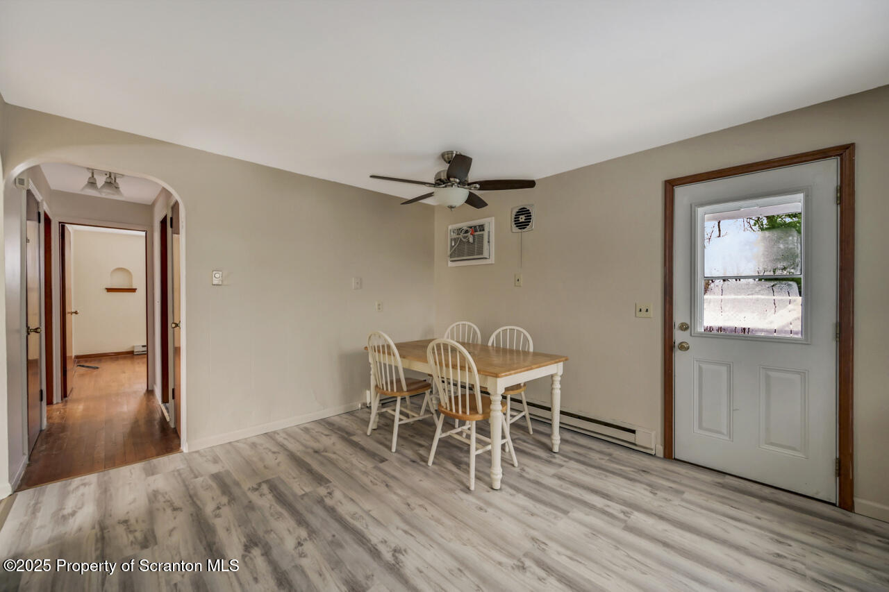 113 Taroli Street Old Forge, PA 18518 - Photo 13 of 41 a view of a livingroom with furniture and wooden floor