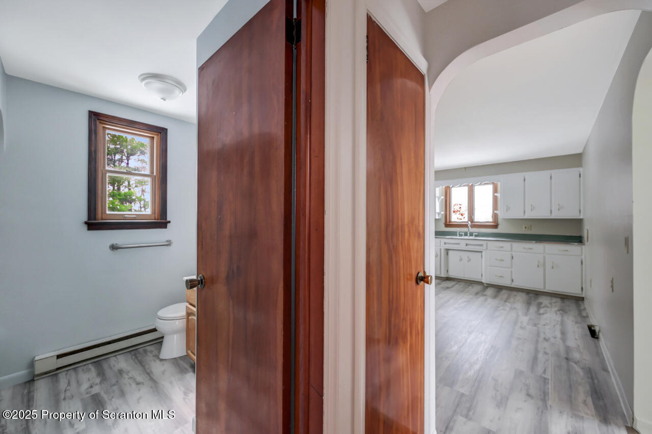 113 Taroli Street Old Forge, PA 18518 - Photo 20 of 41 a view of an empty room and a window