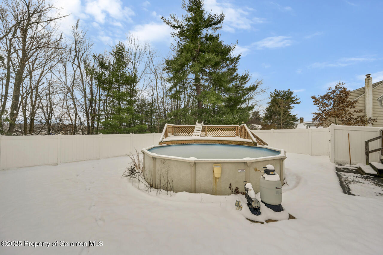 113 Taroli Street Old Forge, PA 18518 - Photo 38 of 41 a view of backyard with swimming pool and seating
