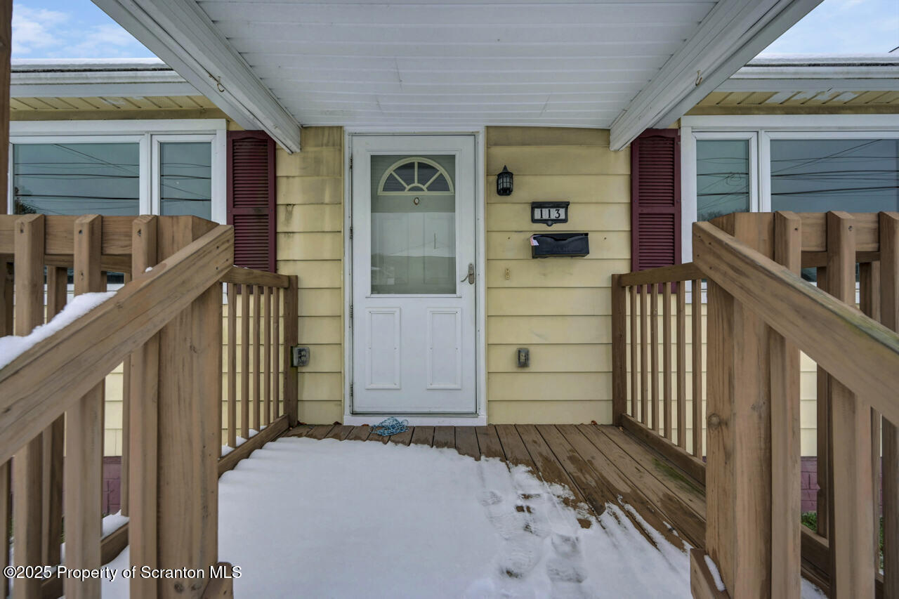 113 Taroli Street Old Forge, PA 18518 - Photo 4 of 41 a front view of a house with a porch