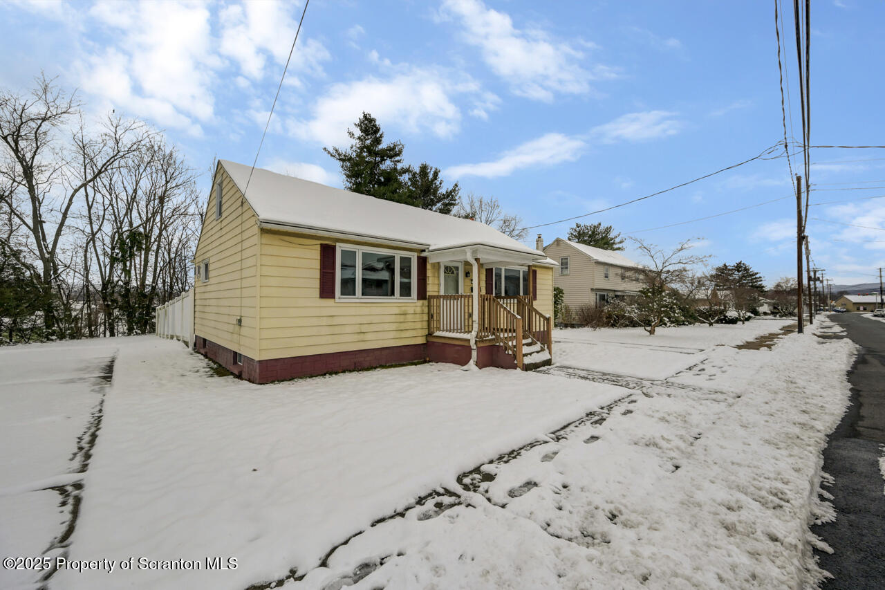 113 Taroli Street Old Forge, PA 18518 - Photo 41 of 41 a view of a house with a snow in the yard