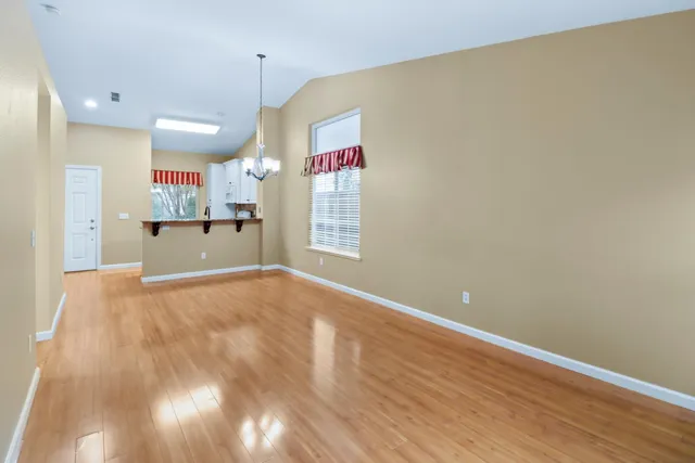 a view of a kitchen and a window